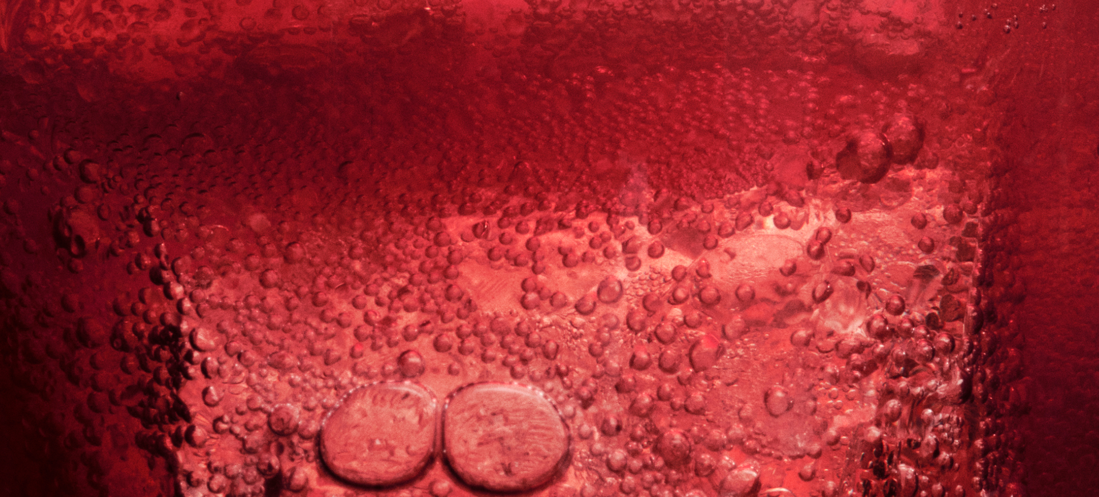 Close-up of bubbles in sparkling red Ghia Le Fizz