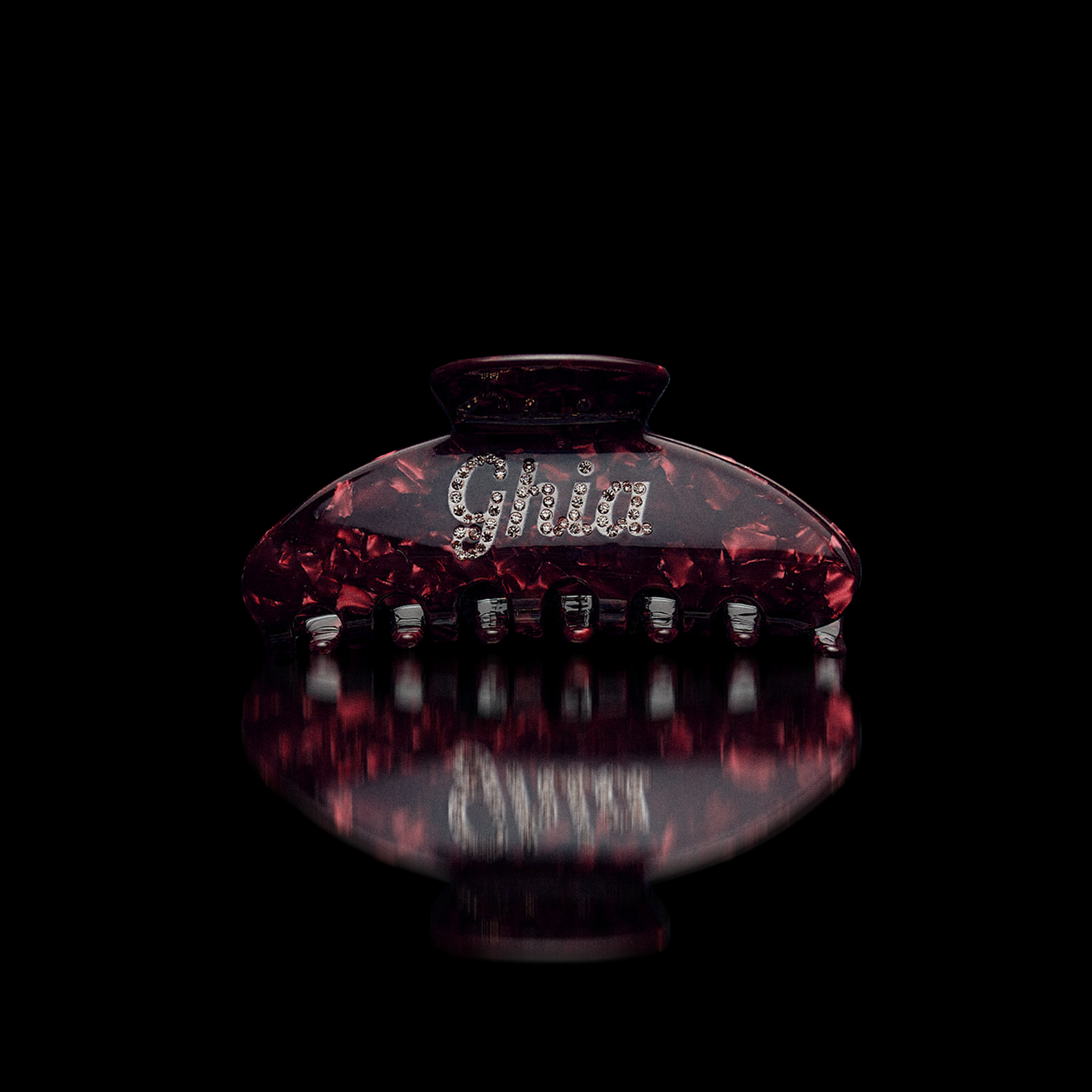 Dark red tortoiseshell Ciao Ghia claw hair clip with Ghia script in rhinestones