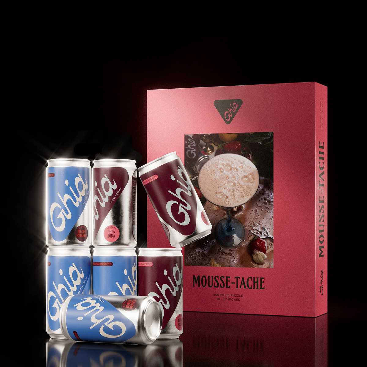 Stacked Ghia spritz cans beside the Mousse-Tache puzzle box showing a frothy espresso drink