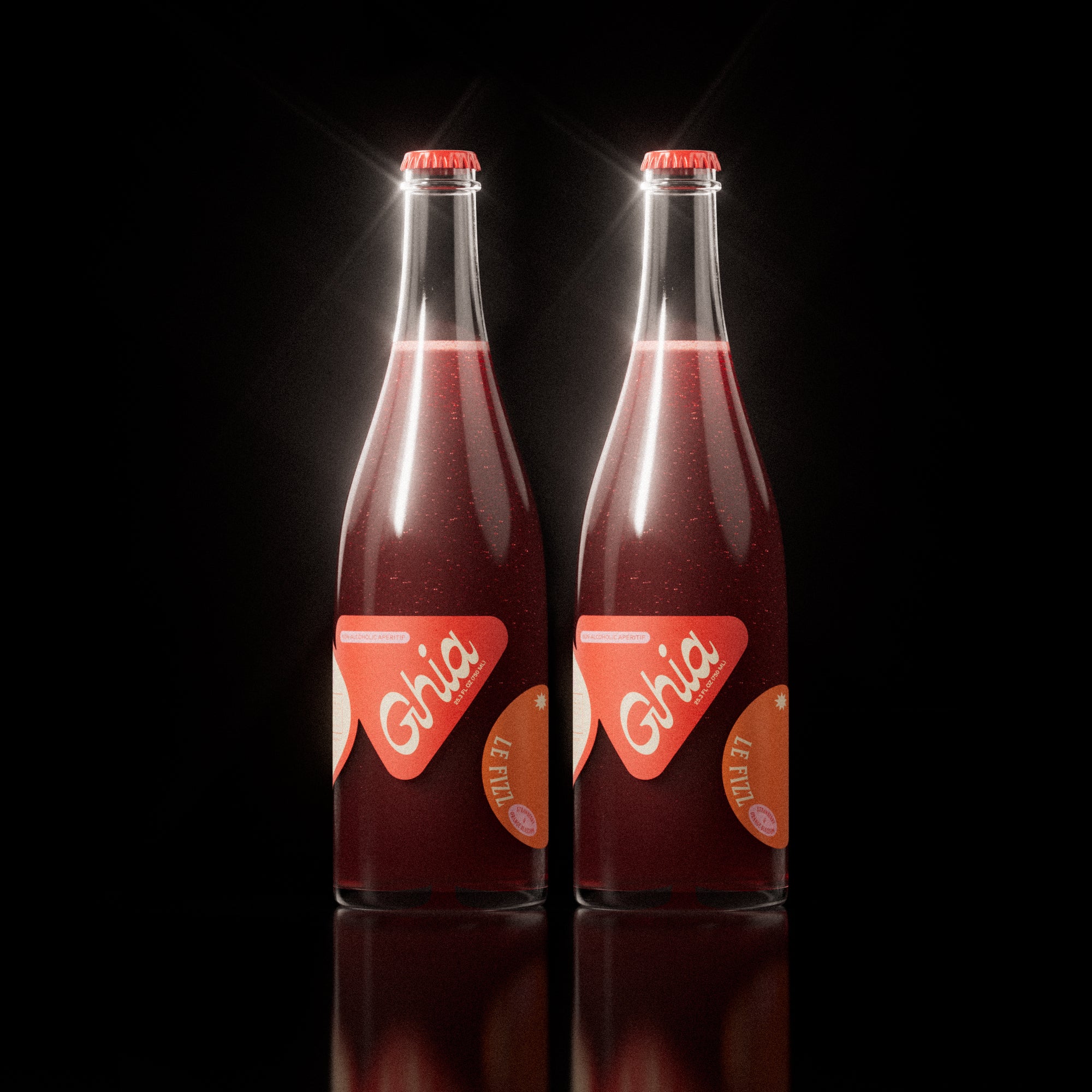 Two bottles of Ghia Le Fizz sparkling apéritif with red caps against a black background