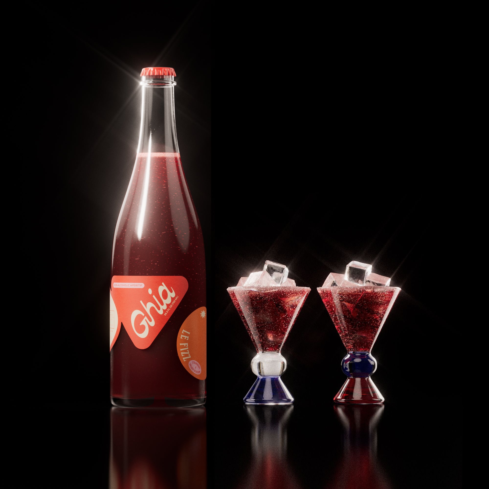 Non-alcoholic spritz in a bottle filled with a deep red strawberry and orange blossom beverage, featuring red labels. Alongside decorative cocktail glass that has a blue and amber base.