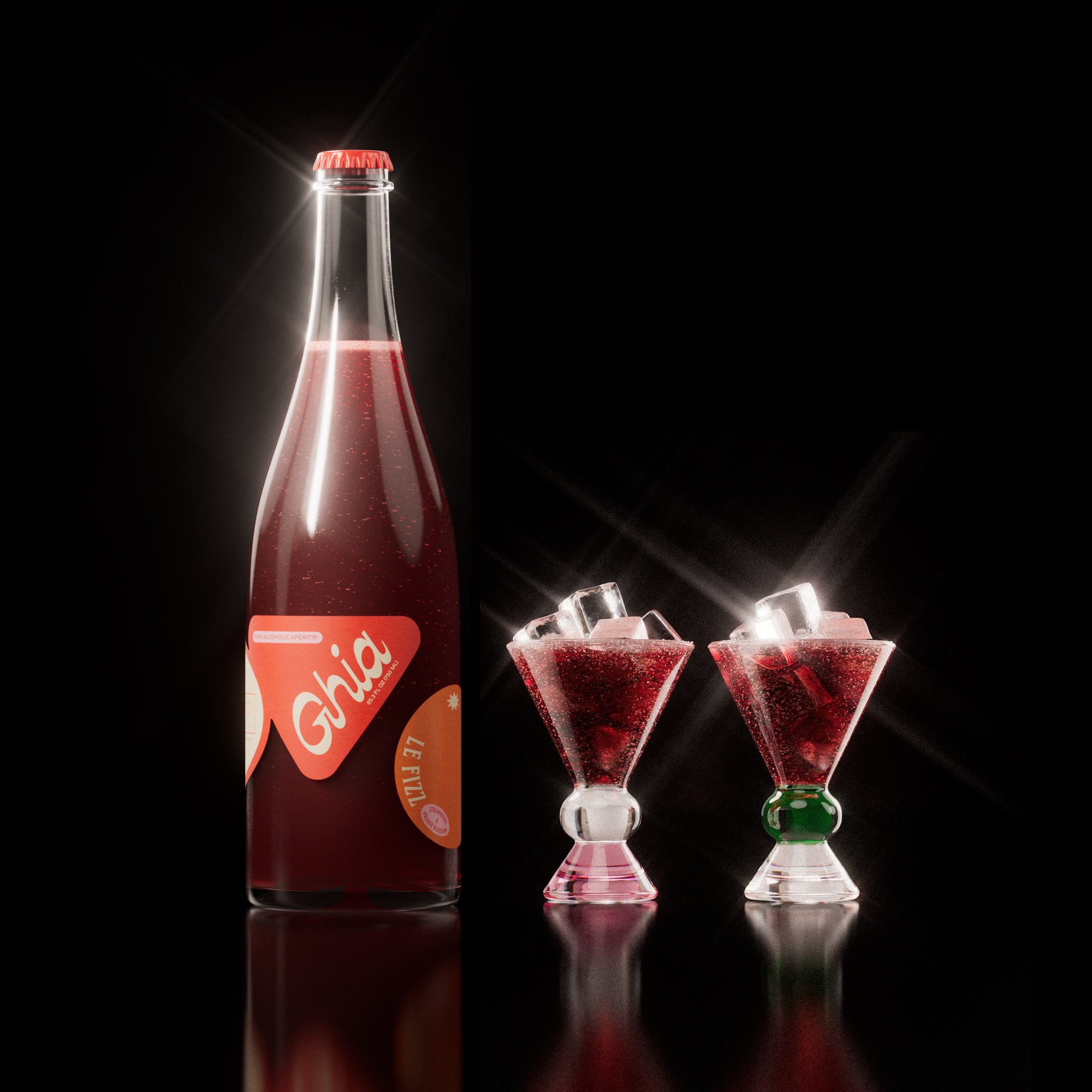 Non-alcoholic spritz in a bottle filled with a deep red strawberry and orange blossom beverage, featuring red labels. Alongside decorative cocktail glass that has a pink, clear and green base.